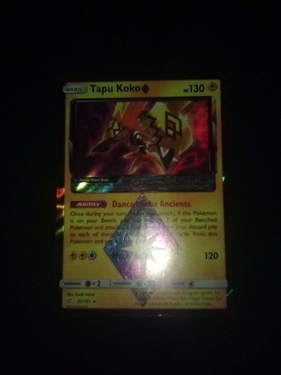 Tapu Koko holographic Pokemon card