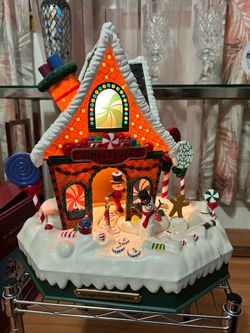 Holiday Creations Christmas Gingerbread House animated lighted musical village scene.