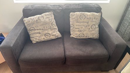 Two grey couches