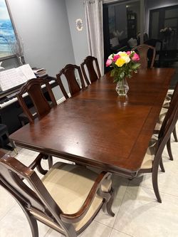 Dining room table and 8 chairs