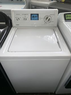 Kenmore top load washer 24in. Working perfectly with 4 months warranty