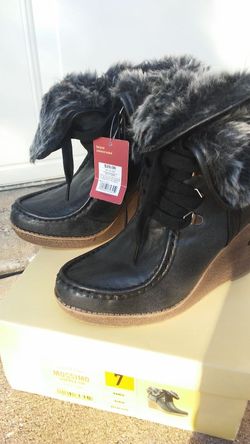 Black wedge boots. With fur inside. I have size 6.5 & 7