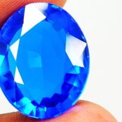 12.00 Ct (Est.) Natural Tanzanite-Like Zoisite Blue Excellent Oval Cut Gemstone. All measurements are approximate. This product is a 12.00 Ct natural 
