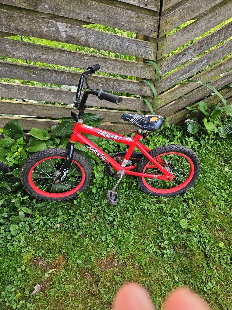 Red kids bike.