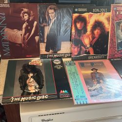  7 Laser Discs . 8”