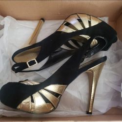Cathy jeans gold and black heels pre owned excellent condition