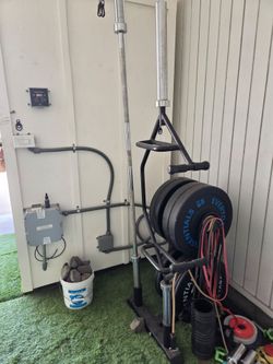 Olympic Bar, trap bar, rack and bumper plates