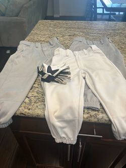 Baseball gloves and pants