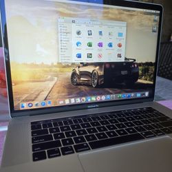 2019 MacBook Pro A1990,i7,16Gb,256Gb,15” LCD, AC Charger, Unlocked, Good Condition