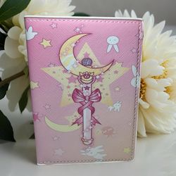 🌙✨ Travel like a true guardian of the moon with this enchanting Sailor Moon wand passport wallet! ✨🌙