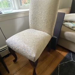 Upholstered cushioned chair