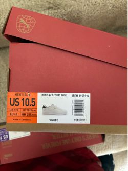 White Puma shoes w/ green size 10 and 10.5