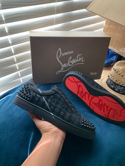 Christian Louboutin with design