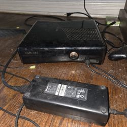 Xbox 360 with controllers and a bunch of games