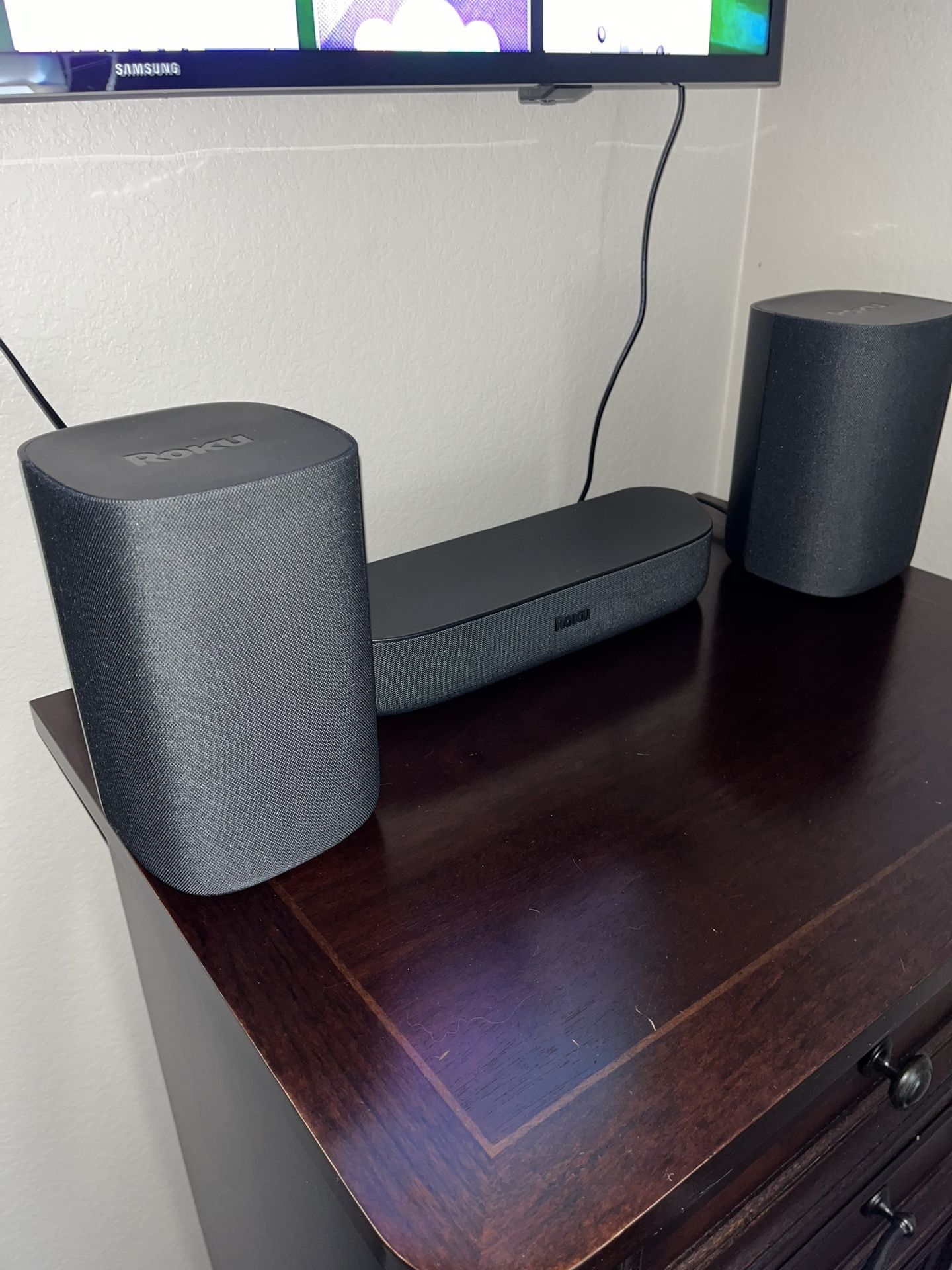 Roku Streambar and two Roku Wireless Speakers