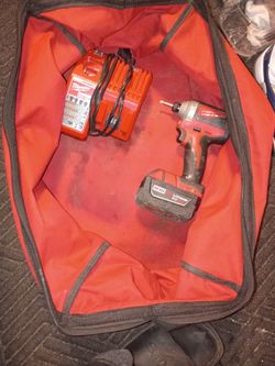 Milwaukee M18 Impact Driver with Battery, Charger and, tool bag