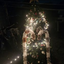 CRESTMUS TREE  FT WITH LIGHT  AND OTHER  VERY GOOD CONDITION 
