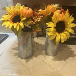 Flower Arranged In Metal Can $6 Each 