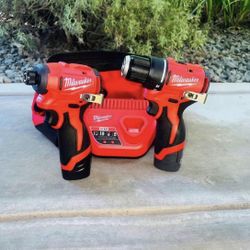 Milwaukee M12 Brushless Subcompact Drill and Impact Driver Combo Kit w/2 Batteries and Bag New !!