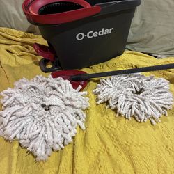 This item is an O-Cedar EasyWring Spin Mop & Bucket System W/2 Mop Heads