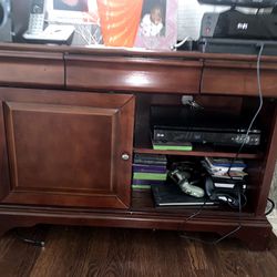 TV stand for sale - solid wood! Dark cherry color - 42” W x 26-1/2” H