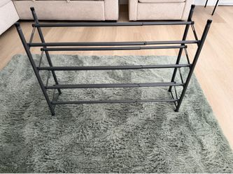 Shoe rack that extends ( last pic is shorter version while first pic is the longest it goes )