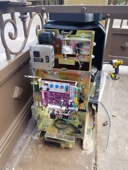 Electric gate shaking, dragging, or jamming? I fix chain, rollers, and tracks