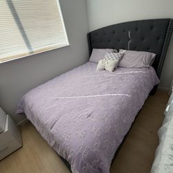 Queen-size bed with mattress