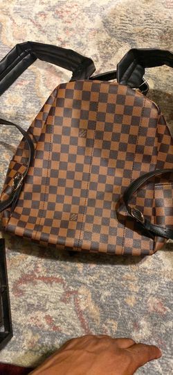 louis vuitton small bookbag