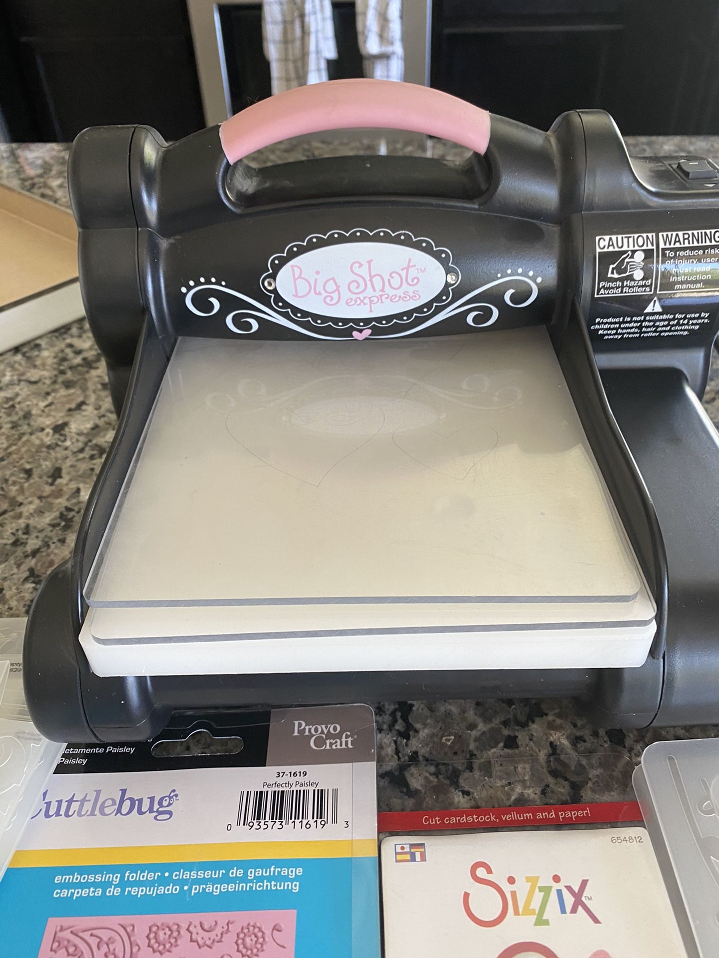 Sizzix electric embossing machine with extras