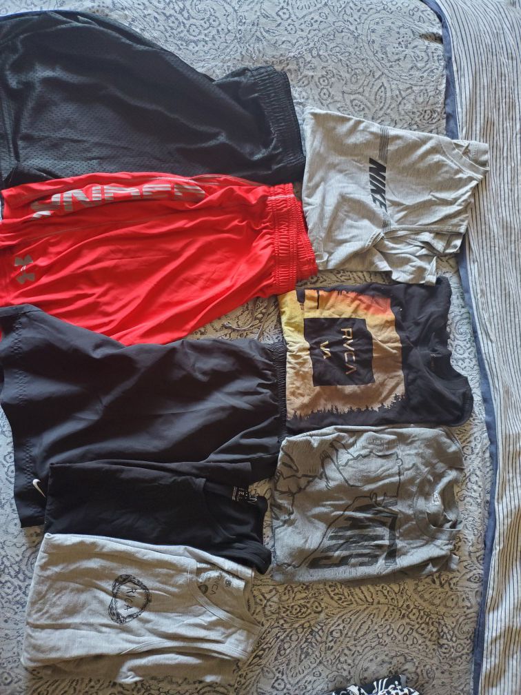 Young mens clothes. Size medium. Van's, rvca, under armour and Nike