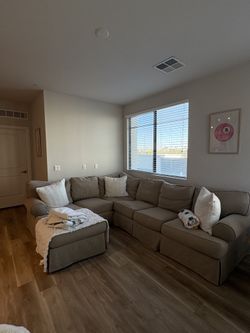 Large light brown/ tan sectional sofa