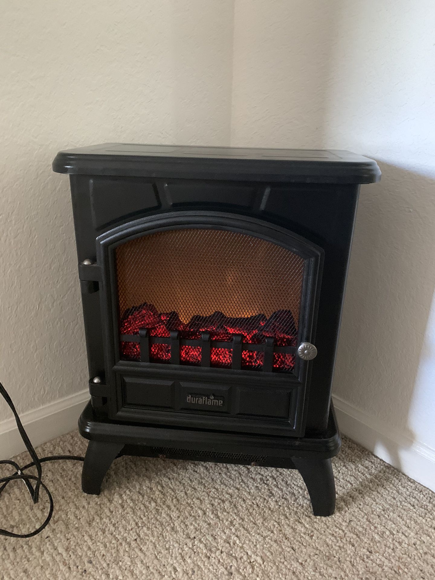 Home Depot electronic fireplace with both heat and only light settings.