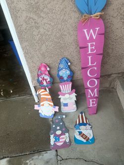 Wooden Gnome and Sign