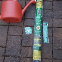Set for garden. 
Watering can, plant twist ties and rope for plants and  Weedbloc diamond.