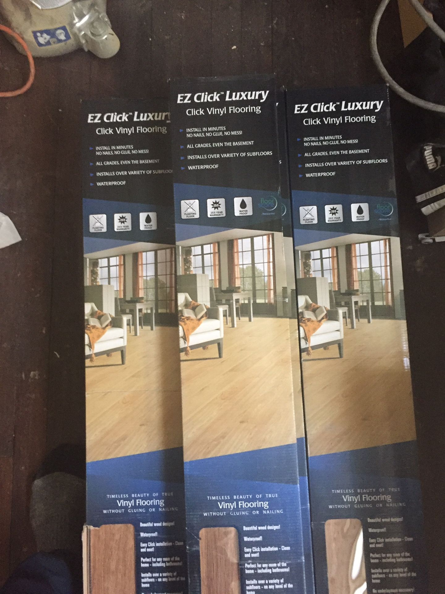 EZ CLICK LUXURY VINYL FLOORS 10 BOXES $15 A PIECE.