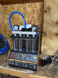 Injector cleaner /tester