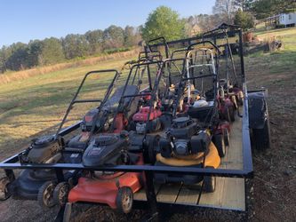 Picking Up Broken Lawn Equipment 