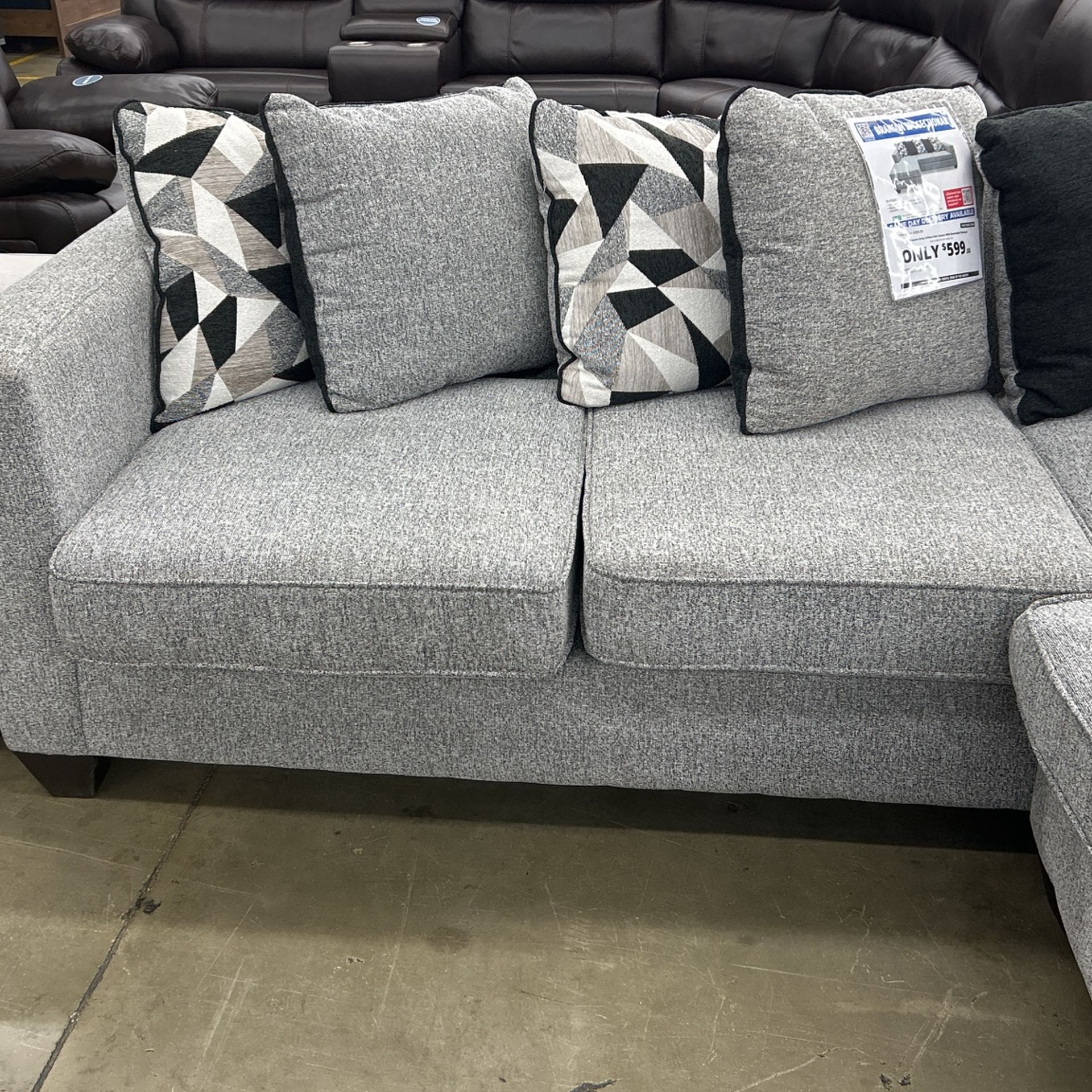 Branson Grey 2PC Sofa Chaise With Reversible ottoman Retail $999 Savings of $400