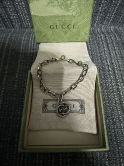 STERLING SILVER GUCCI INTERLOCKING G CHARM BRACELET  