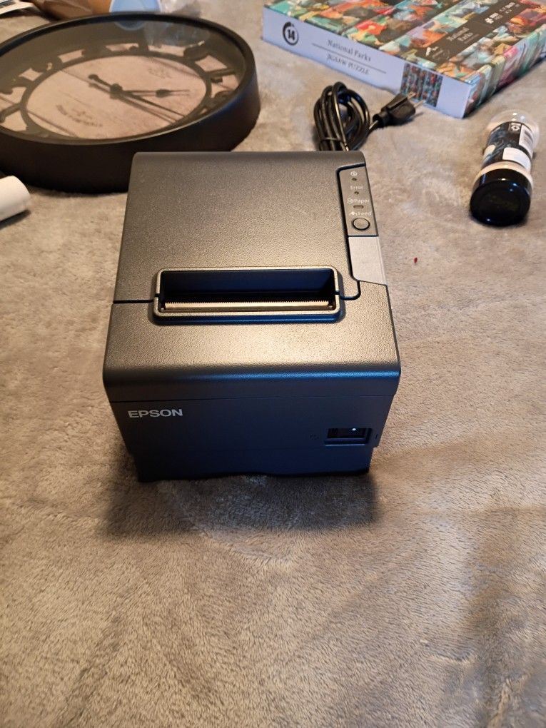Epson TM-T88V thermal receipt printer.