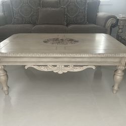 Ashley furniture coffee table with 3 side tables