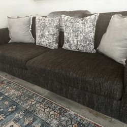 Dark Grey Couch . Great Condition . No Tears 