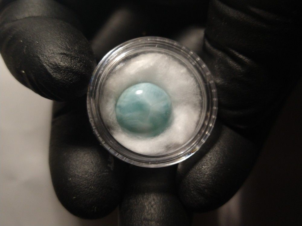 Natural Larimar Cabochon In Display 