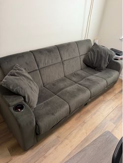 Fabric Futon with side pocket storage.