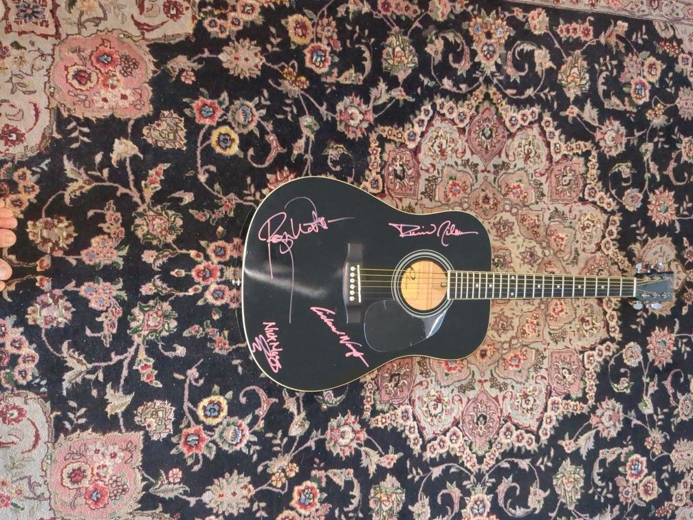 Black Acoustic Guitar Signed by Pink Floyd