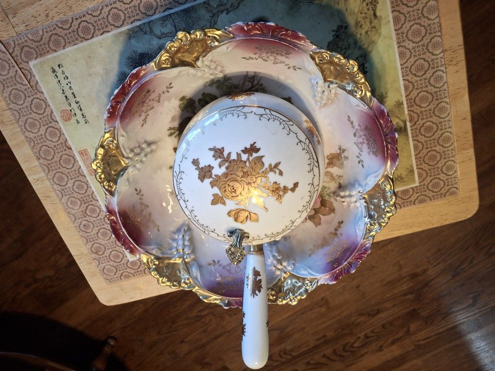 TWO SUPER NICE PIECES ONE IS A VINTAGE SILENT BUTLER CRUMB CATCHER HOLLYWOOD REGENCY GOLD THE BOWL IS VERY GORGEOUS LOOKING MADE IN German