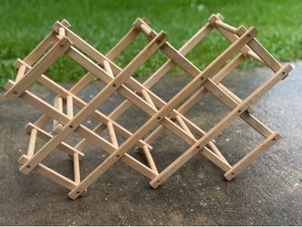 wood accordion wine rack (10$)