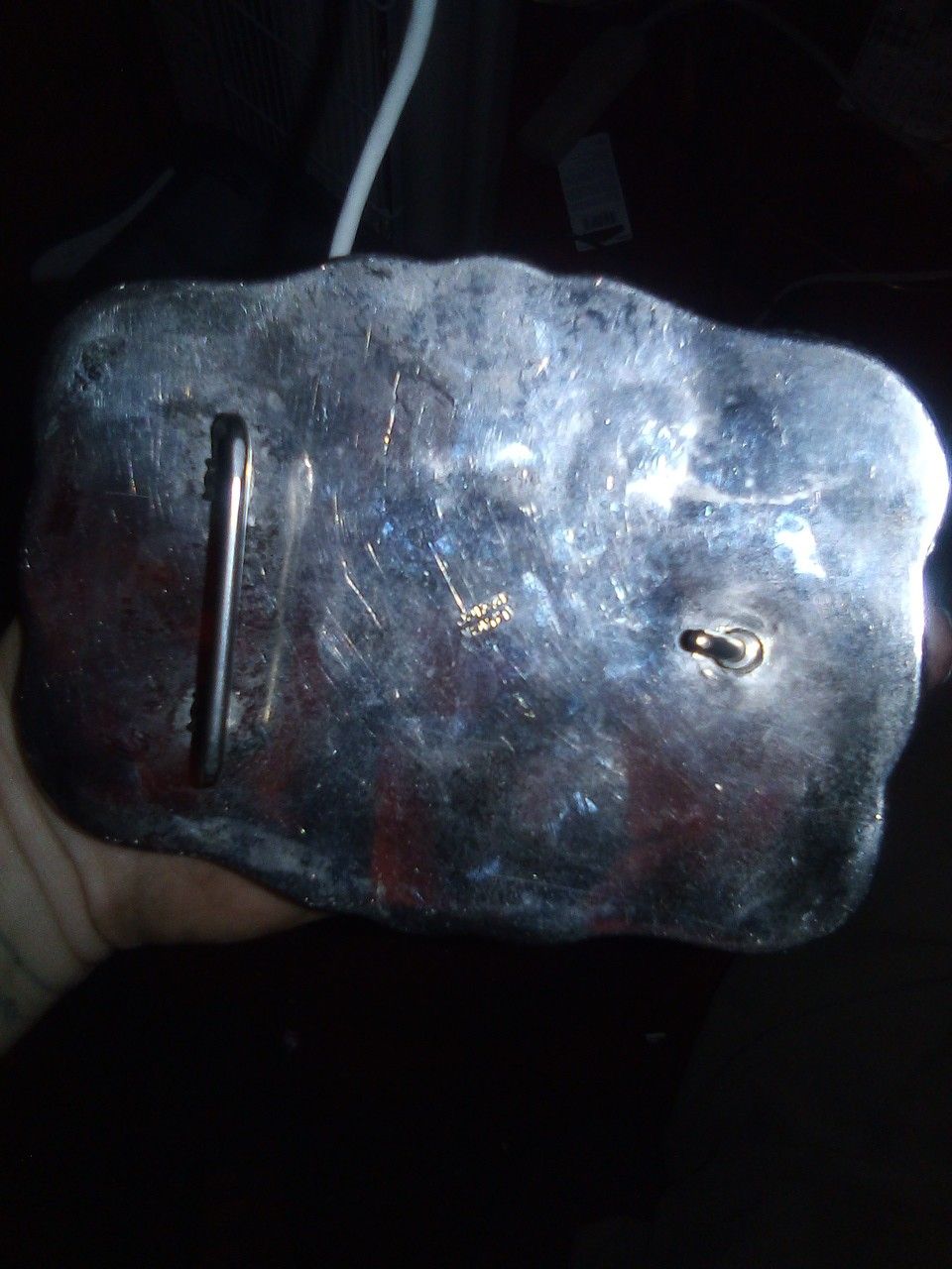 Silver rodeo belt buckle