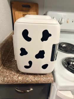 Cow print mini refrigerator/make up refrigerator